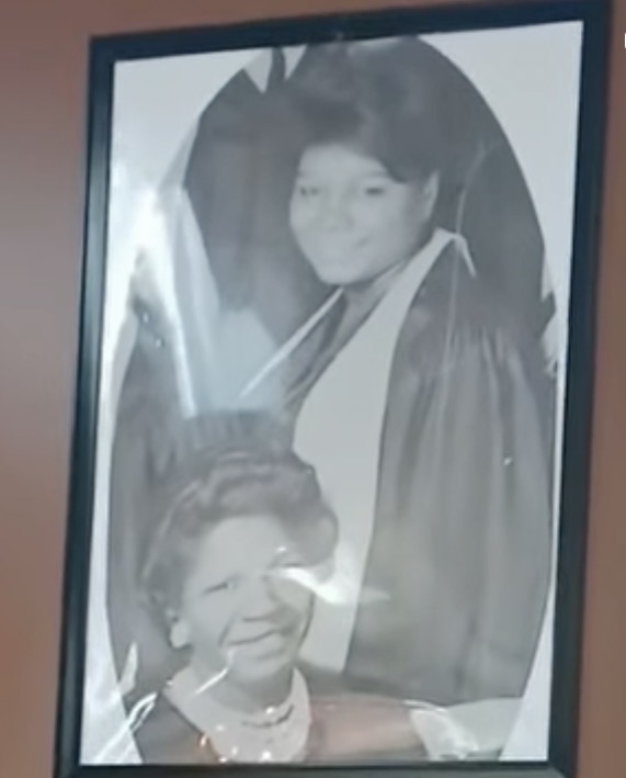 Framed portrait of Eleanor and family on the café wall